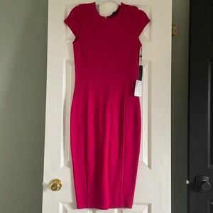 MIDI length dress in Fuscia.